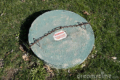 septic tank in grass